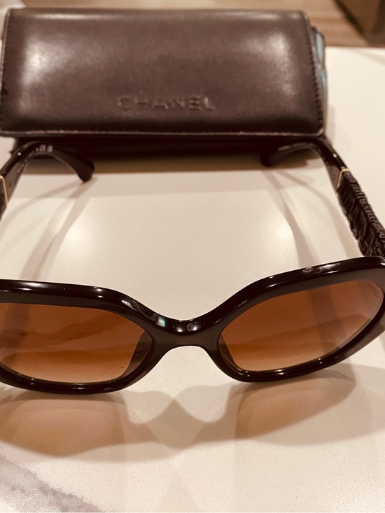 CHANEL Women\'s Brown Oval Sunglasses with Amber Lenses